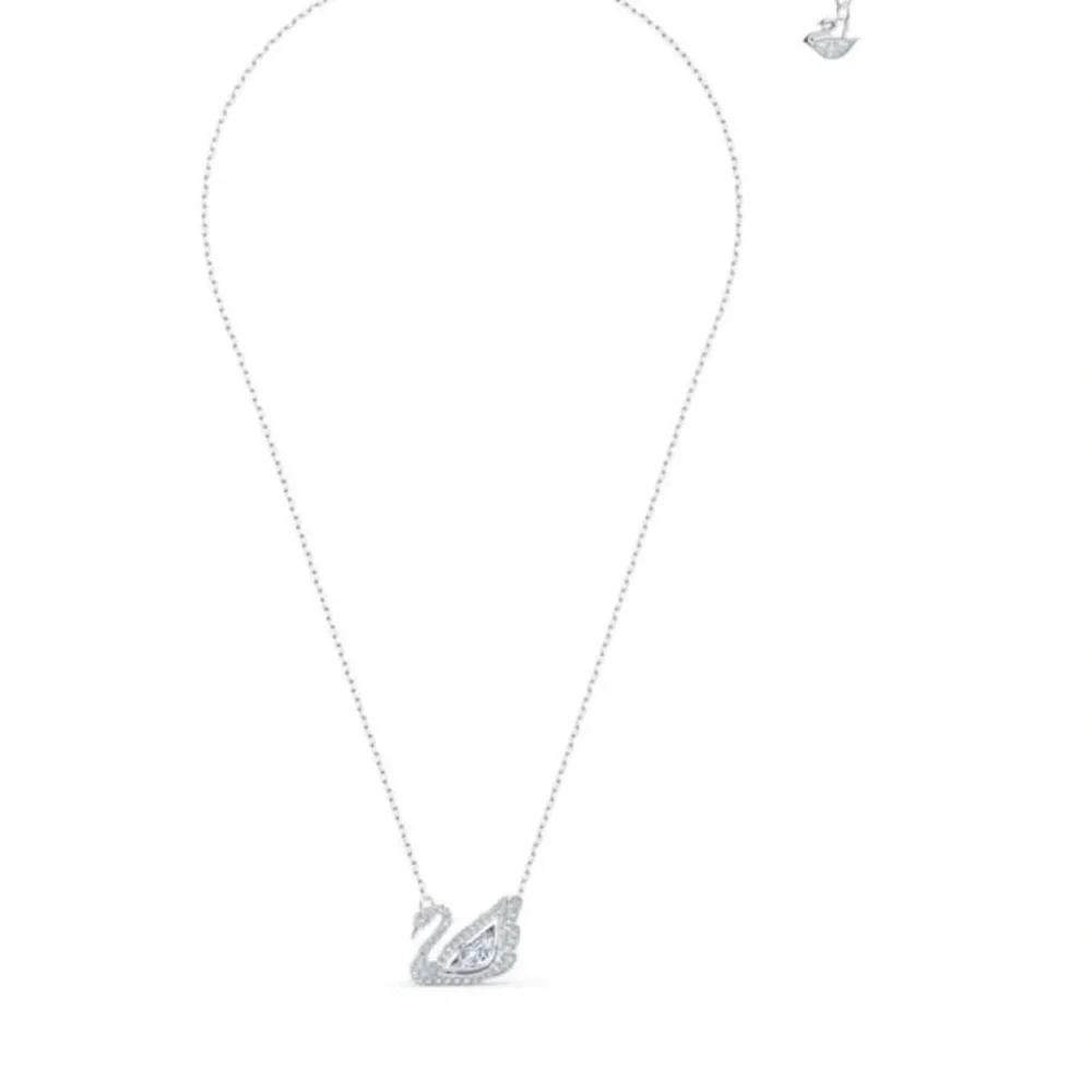 - Swan necklace white rhodium plated from swarovski
